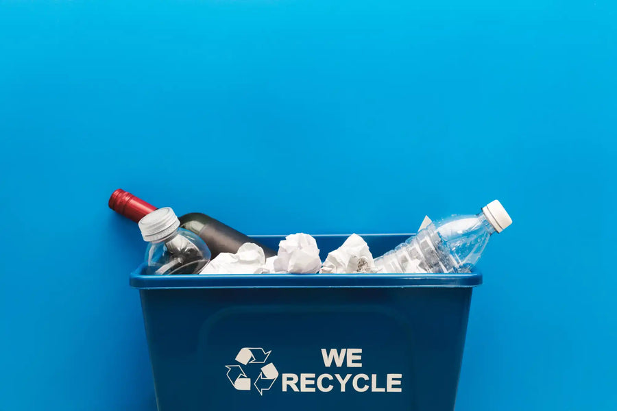 Blue recycling bin.